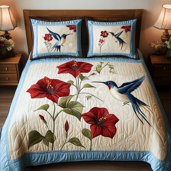 Flight Mirage quilted 3-piece bedding set on a made bed with two matching pillow shams