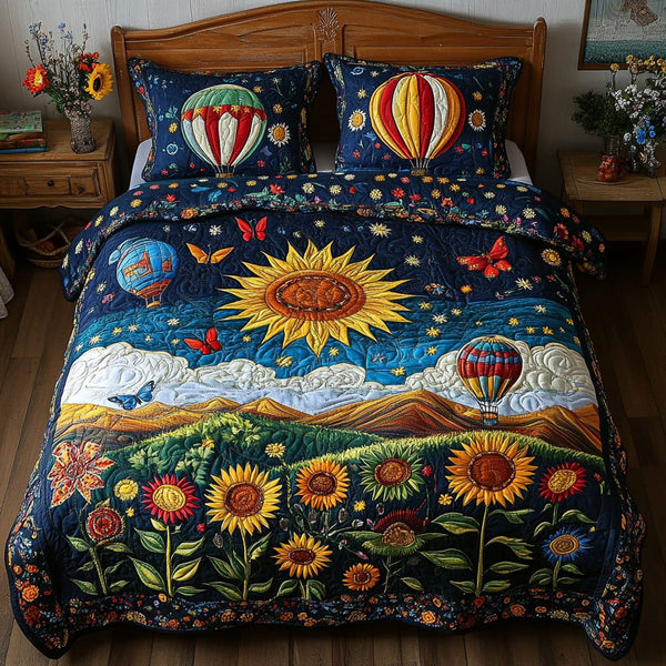 Flight Over Fields quilted 3-piece bedding set on a made bed with two matching pillow shams