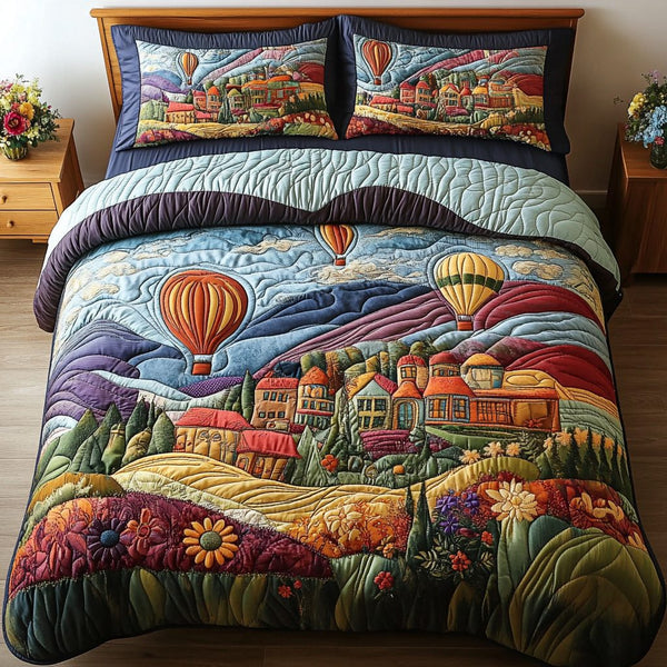 Floating Haven quilted 3-piece bedding set on a made bed with two matching pillow shams