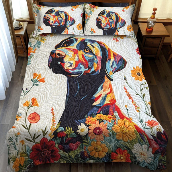 Floral Adorable Labrador quilted 3-piece bedding set on a made bed with two matching pillow shams