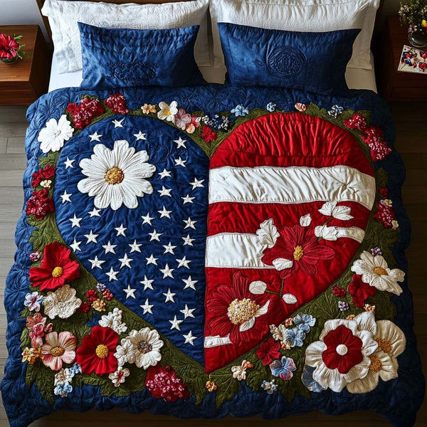 Floral Allegiance quilted 3-piece bedding set on a made bed with two matching pillow shams