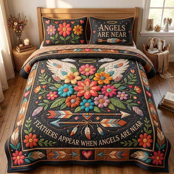 Floral Angel Feathers quilted 3-piece bedding set on a made bed in a softly lit bedroom