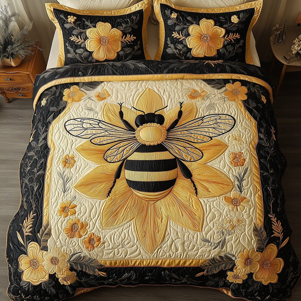 Floral Bee quilted 3-piece bedding set on a made bed with two matching pillow shams