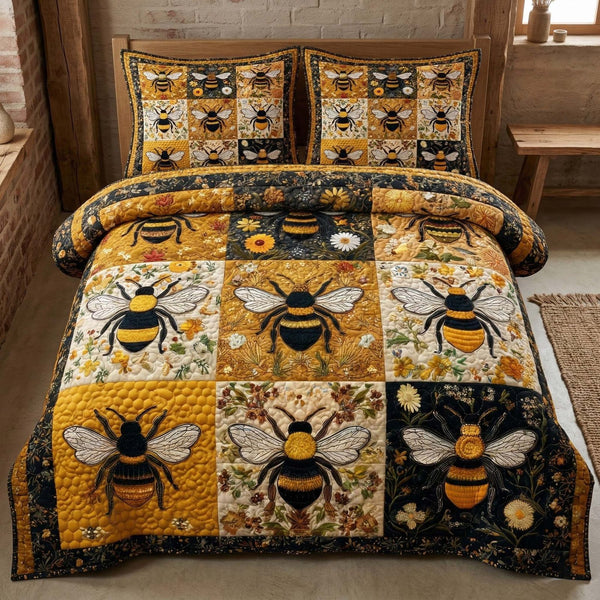 Floral Bee quilted 3-piece bedding set on a made bed with two matching pillow shams