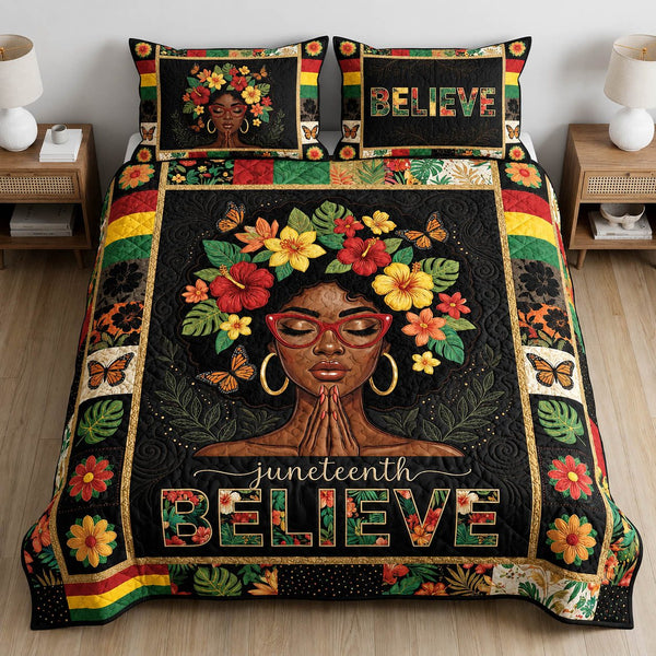 Floral Believe quilted 3-piece bedding set on a made bed with two matching pillow shams