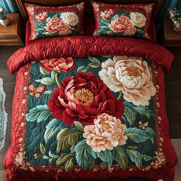 Floral Bliss quilted 3-piece bedding set on a made bed with two matching pillow shams