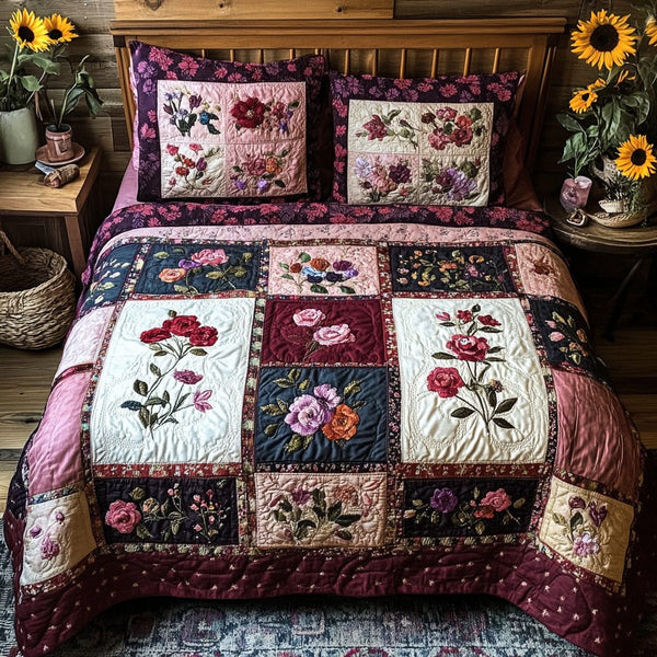 Floral Bliss quilted 3-piece bedding set on a made bed with two matching pillow shams