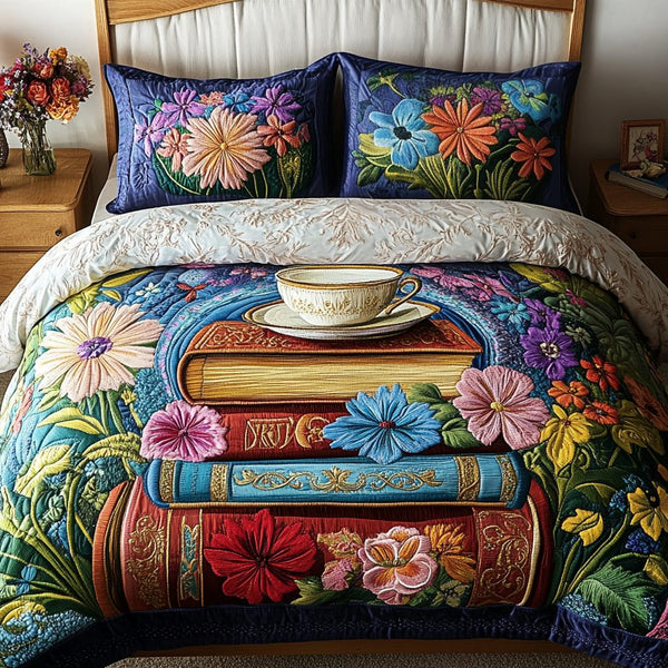 Floral Book Nook quilted 3-piece bedding set on a made bed with two matching pillow shams
