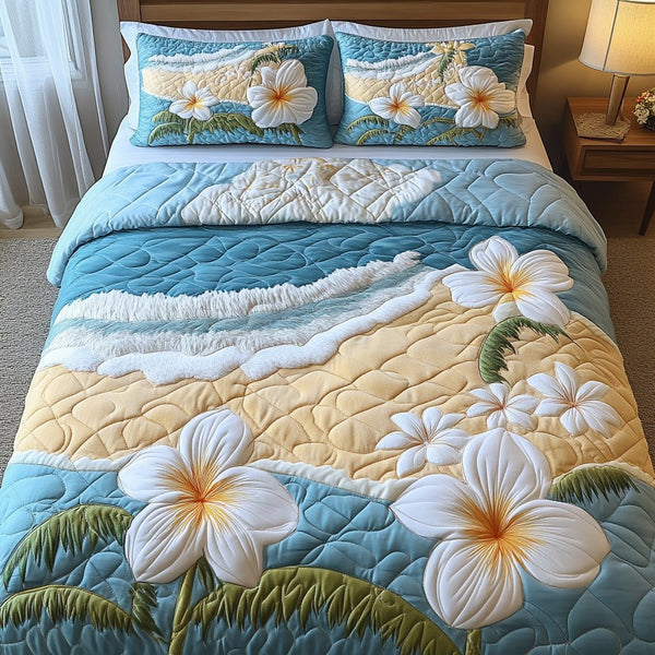 Floral Breeze quilted 3-piece bedding set on a made bed with two matching pillow shams