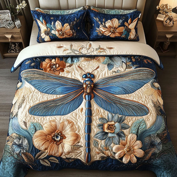 Floral Breeze quilted 3-piece bedding set on a made bed with two matching pillow shams