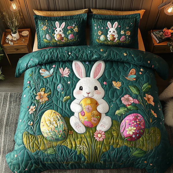 Floral Bunnies quilted 3-piece bedding set on a made bed with two matching pillow shams