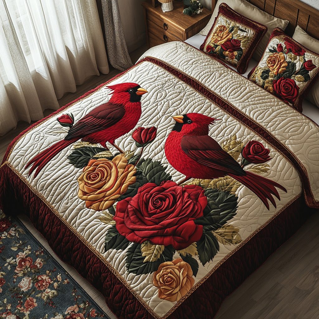 Floral Cardinal quilted 3-piece bedding set on a made bed with two matching pillow shams