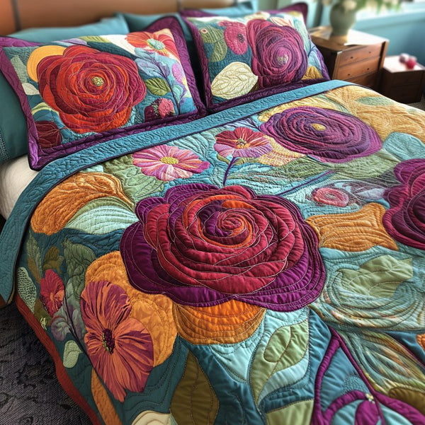 Floral Charm quilted 3-piece bedding set on a made bed with two matching pillow shams