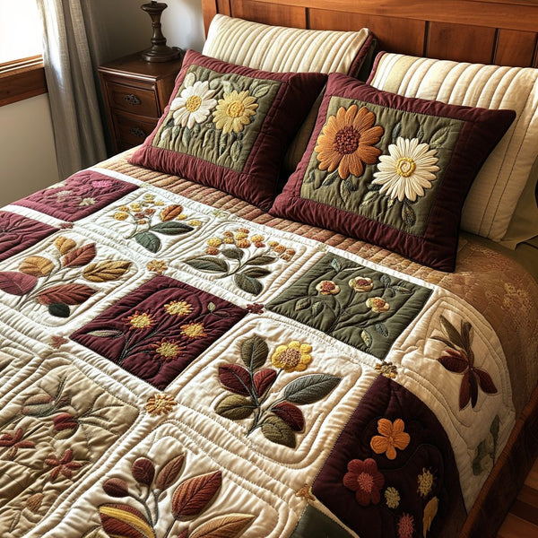 Floral Charm quilted 3-piece bedding set on a made bed with two matching pillow shams