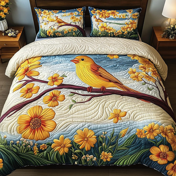 Floral Charm quilted 3-piece bedding set on a made bed with two matching pillow shams