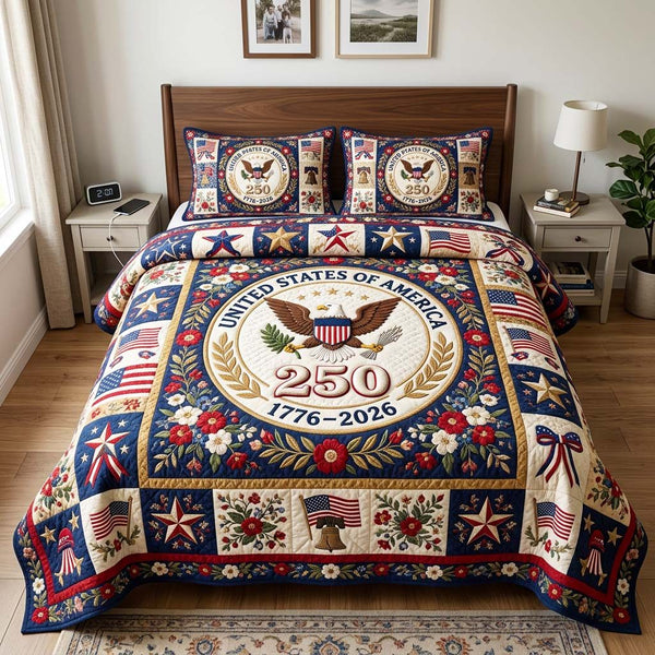 Floral Crest quilted 3-piece bedding set on a made bed with two matching pillow shams