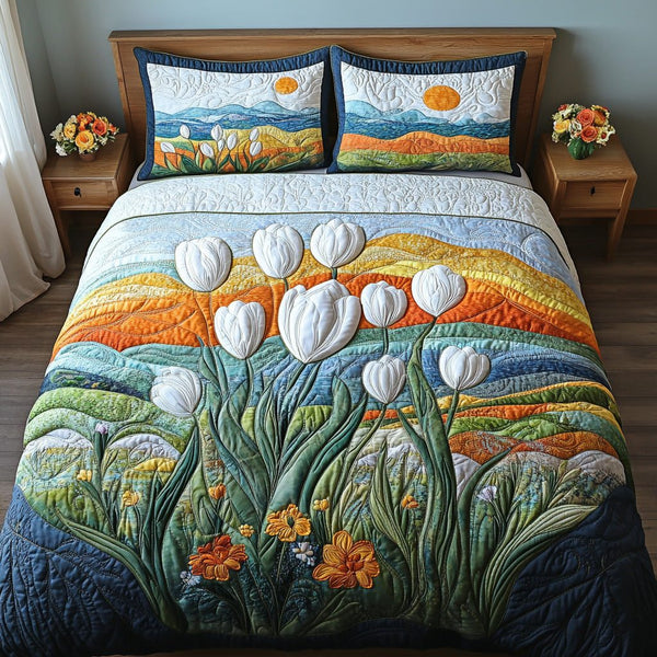Floral Dawn quilted 3-piece bedding set on a made bed with two matching pillow shams