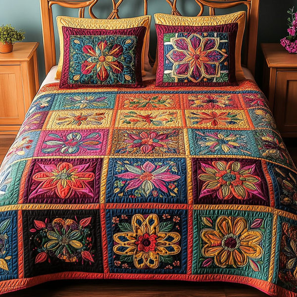 Floral Dream quilted 3-piece bedding set on a made bed with two matching pillow shams