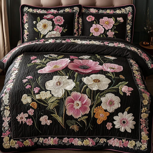 Floral Dream quilted 3-piece bedding set on a made bed with two matching pillow shams