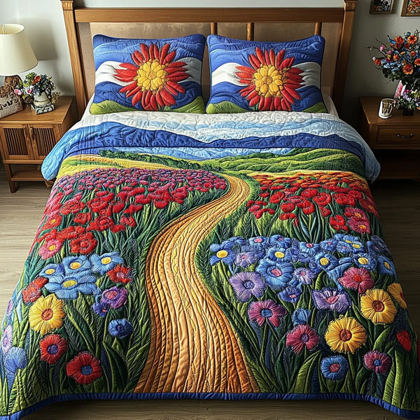 Floral Dreamscape quilted 3-piece bedding set on a made bed with two matching pillow shams