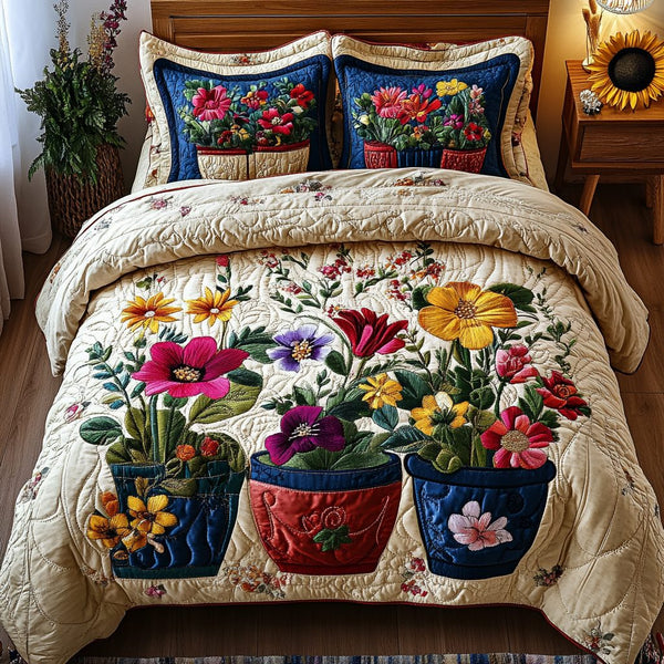 Floral Dreamscape quilted 3-piece bedding set on a made bed with two matching pillow shams