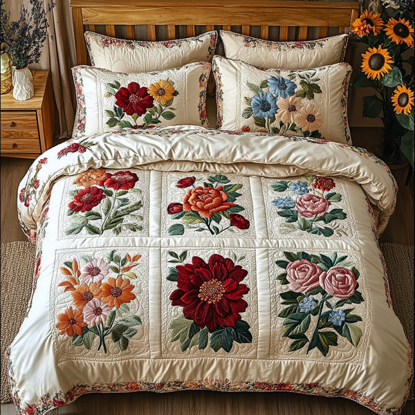 Floral Dreamscape quilted 3-piece bedding set on a made bed with two matching pillow shams
