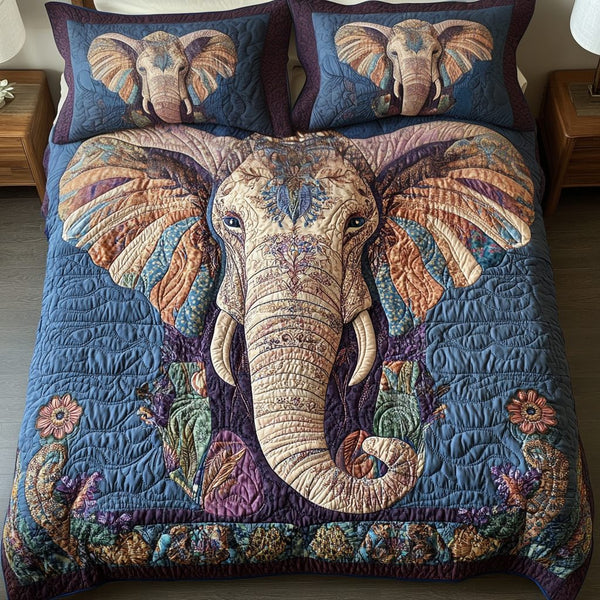 Floral Elegance Elephant quilted 3-piece bedding set on a made bed with two matching pillow shams