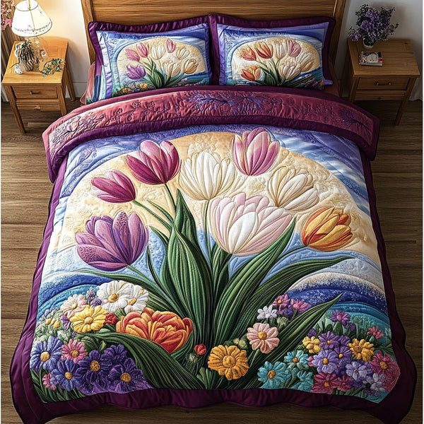 Floral Elegance quilted 3-piece bedding set on a made bed with two matching pillow shams