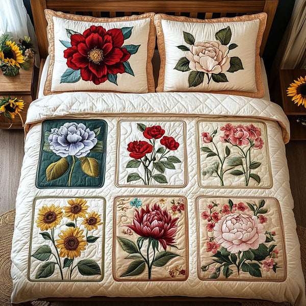 Floral Essence quilted 3-piece bedding set on a made bed with two matching pillow shams