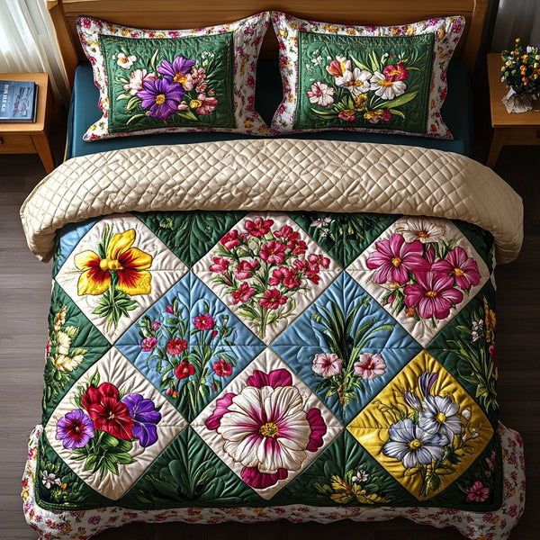 Floral Fiesta quilted 3-piece bedding set on a made bed with two matching pillow shams