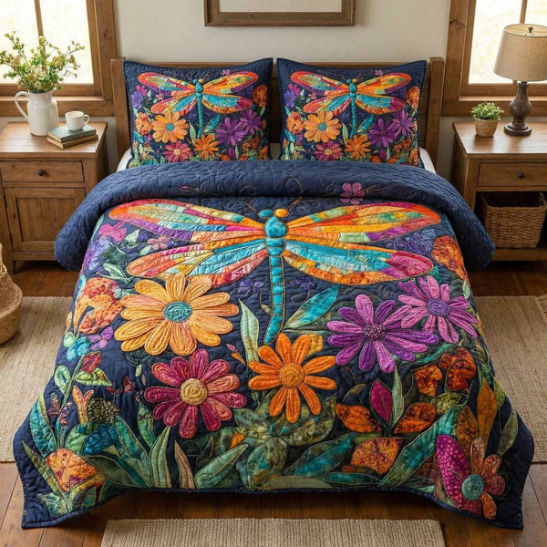 Floral Fiesta quilted 3-piece bedding set on a made bed with two matching pillow shams