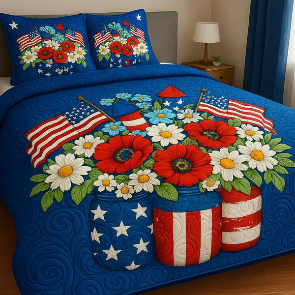 Floral Fireworks quilted 3-piece bedding set on a made bed with two matching pillow shams