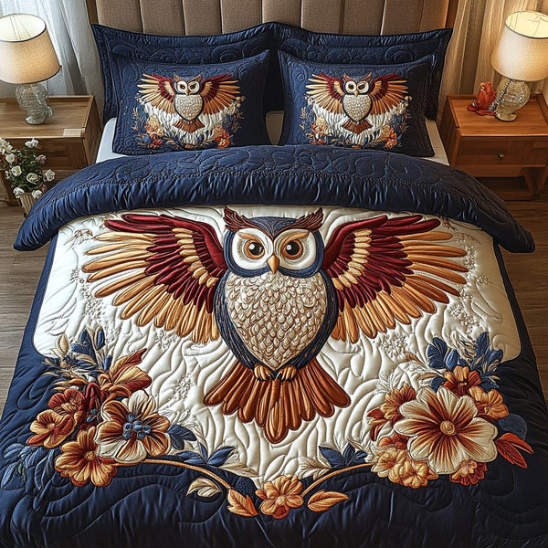 Floral Flight quilted 3-piece bedding set on a made bed with two matching pillow shams