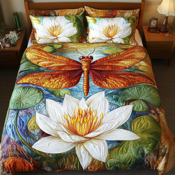 Floral Flight quilted 3-piece bedding set on a made bed with two matching pillow shams