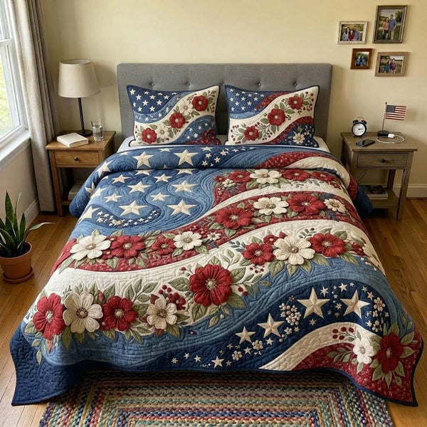Floral Freedom quilted 3-piece bedding set on a made bed in a warmly lit bedroom