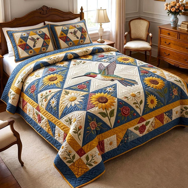 Floral Garden quilted 3-piece bedding set on a made bed with two matching pillow shams