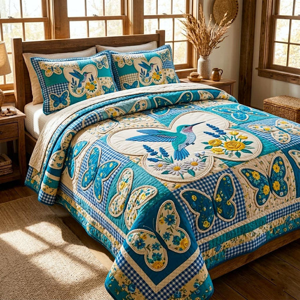 Floral Garden quilted 3-piece bedding set on a made bed with two matching pillow shams