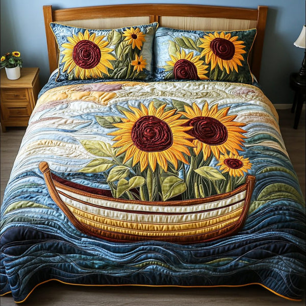 Floral Glow quilted 3-piece bedding set on a made bed with two matching pillow shams
