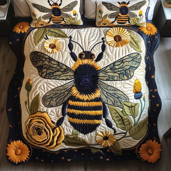 Floral Guardian quilted 3-piece bedding set on a made bed with two matching pillow shams