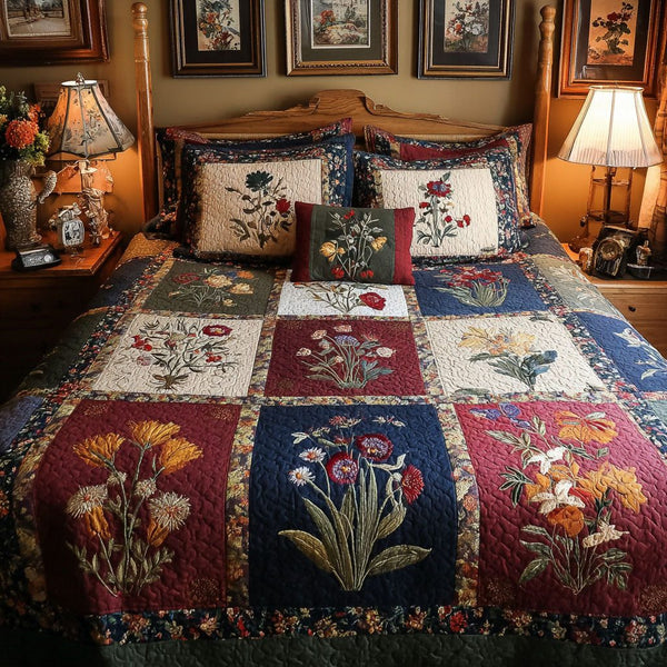 Floral Harmony quilted 3-piece bedding set on a made bed with two matching pillow shams
