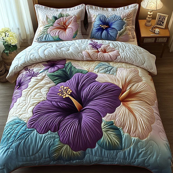 Floral Harmony quilted 3-piece bedding set on a made bed with two matching pillow shams