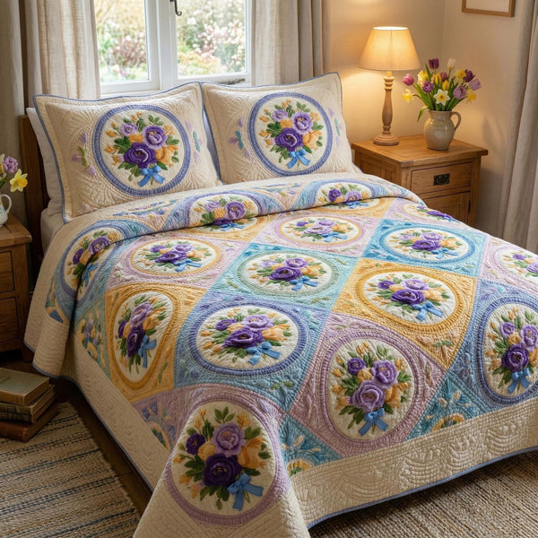 Floral Harmony quilted 3-piece bedding set on a made bed with two matching pillow shams