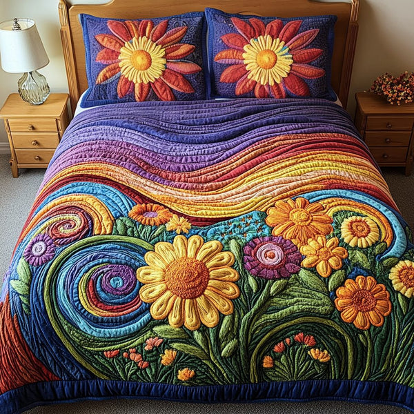 Floral Harmony quilted 3-piece bedding set on a made bed with two matching pillow shams