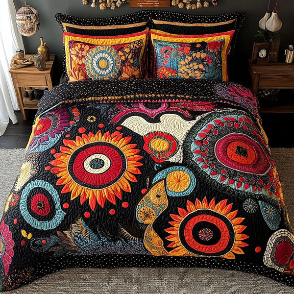 Floral Haven quilted 3-piece bedding set on a made bed with two matching pillow shams