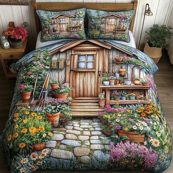 Floral Haven quilted 3-piece bedding set on a made bed with two matching pillow shams