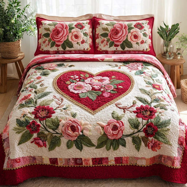 Floral Heart quilted 3-piece bedding set on a made bed with two matching pillow shams