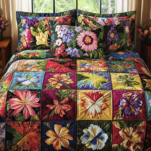 Floral Heirloom quilted 3-piece bedding set on a made bed with two matching pillow shams