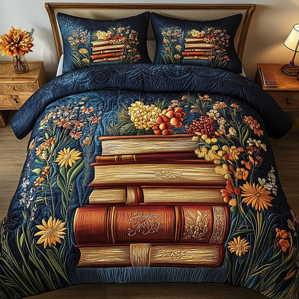 Floral Knowledge quilted 3-piece bedding set on a made bed with two matching pillow shams