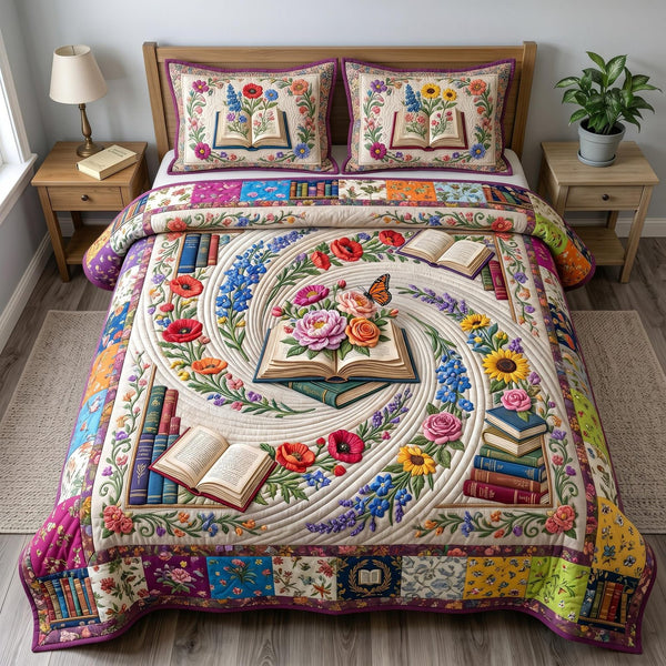 Floral Library quilted 3-piece bedding set on a made bed with two matching pillow shams