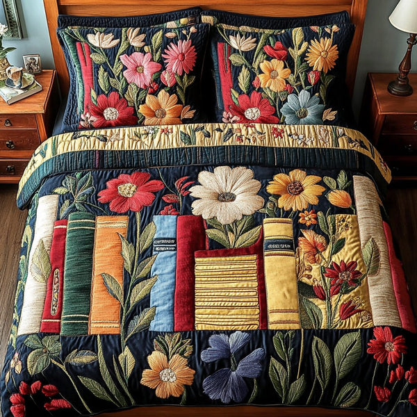 Floral Library quilted 3-piece bedding set on a made bed with two matching pillow shams